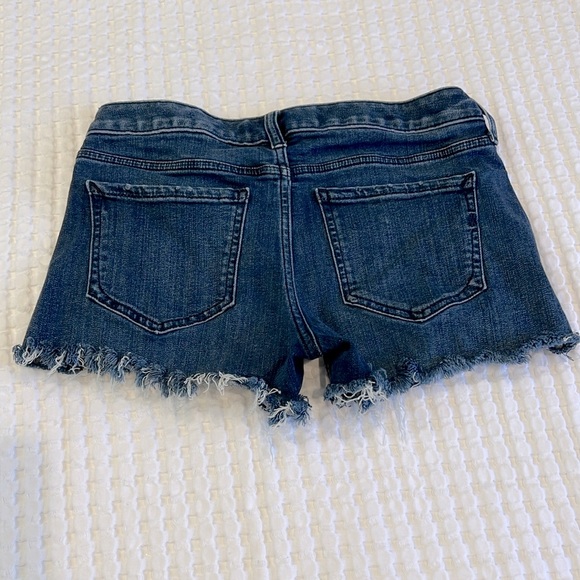 🫐Express Shortie Cut Off Blue Jean Shorts in Size 0 Relaxed Low Rise - Picture 2 of 5